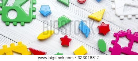Kids Educational Developing Toys Frame On White Background. Top View. Flat Lay. Copy Space For Text