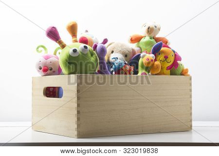 Toys Collection In Box Isolated On White Background. Donatation. Copy Space For Text