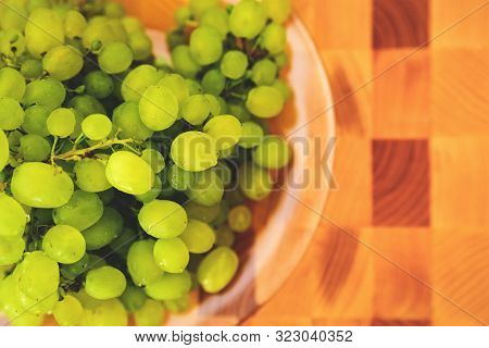 Green Grape On The Wooden Cutting Board