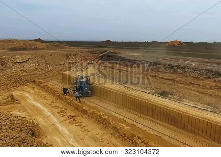 Shell Quarry Quarry. Cutting A Seashell Into Blocks Right Away In A Quarry.
