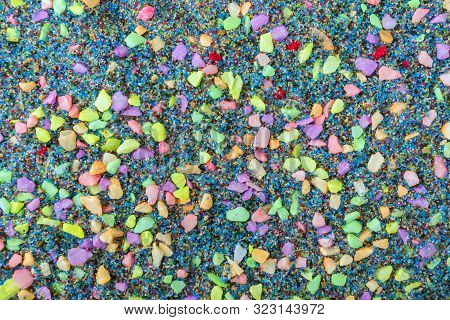 Top View With Background Of Multi-colored Small Pebbles. Multi-colored Pebbles For Garden Decoration