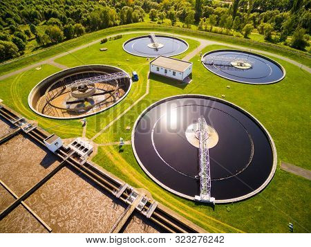 Aerial view to sewage treatment plant. Grey water recycling. Waste management in European Union.
