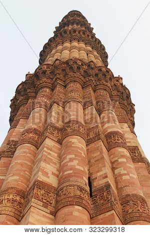 New Delhi, India - October 2014: Vertical close up view of Qutub Minar