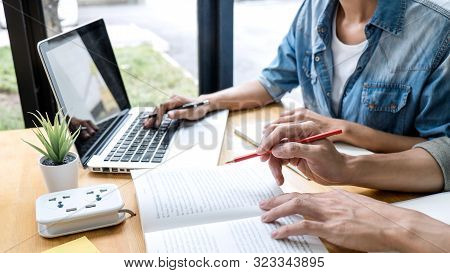Education, Teaching, Learning Concept. High School Students Or Classmates Group Tutor In Library Stu