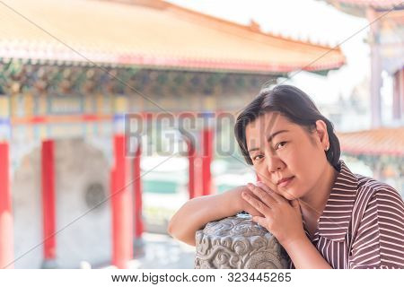 Woman At Wat Boromracha Kanchanapisek Anusorn