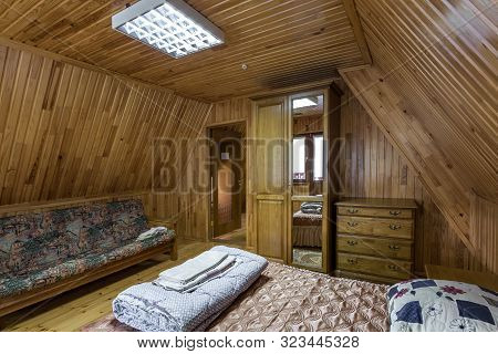 Grodno, Belarus -  August 2019: Living Bedroom On Attic Of Wooden Vacation Eco House