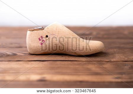 Leather Samples For Shoes And Wooden Shoe Last On Dark Wooden Table. Designer Furniture Clothes. Sho