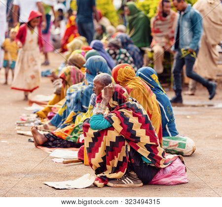 Bahir Dar, Ethiopia, April 21th. 2019, Orthodox Christian Pilgrim Wrapped In Blankets In A Cold East