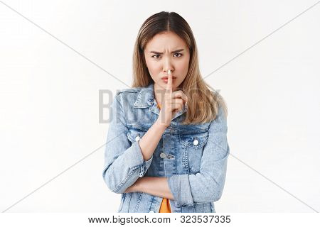 Shh Behave Well. Serious-looking Bossy Elfer Sister Asian Blond Girl Frowning Displeased Shushing Sh
