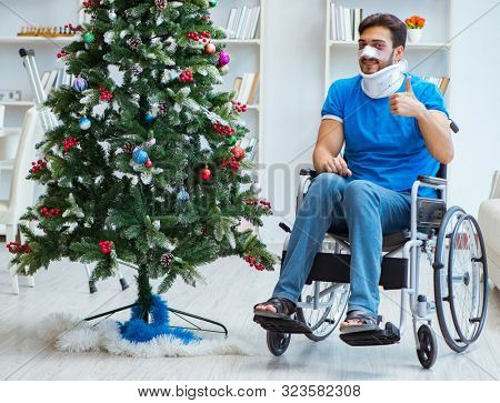 Injured disabled man celebrating christmas at home