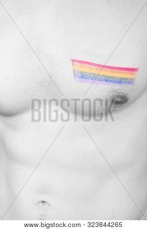 Homosexual Concept Showing A Gay Pride Flag Drawn On A Black And White Male Torso