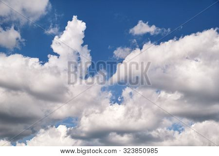 The Clear Blue Sky With White Clouds, Closeup / Very Fine Weather With Stratocumulus And Cumulus Clo
