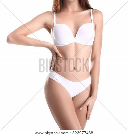Young Woman In Black Lingerie Isolated On White Background