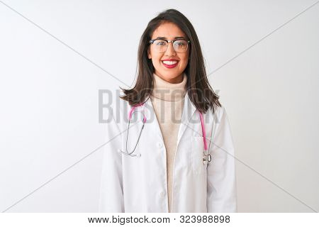 Chinese doctor woman wearing coat and pink stethoscope over isolated white background with a happy and cool smile on face. Lucky person.