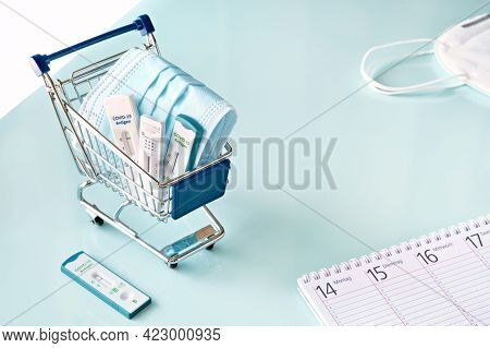 Cost Of Shnelltest, Express Corona Test In German Language. Shopping Cart With Covid 19 Antigen Test