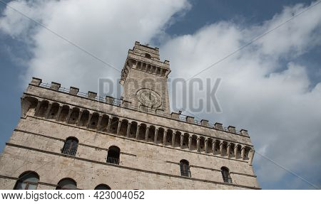 Pulcinella Clock Tower Building At Piazza Grande In Montepulciano Village , Tuscany Italy
