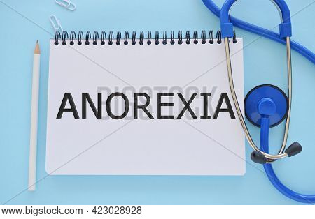 Anorexia Text Written In Notebook . Concept Image. Anorexia Syndrome