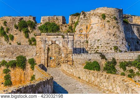 Venetian fort castle Methoni on the Greek Peninsula Peloponnese. The millennial protective walls were overgrown with bushes. The concept of active, photo, ecological and historical tourism