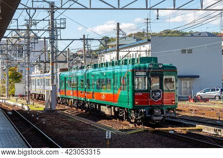 Wakayama, Japan - November 24, 2018 : Green And Red Tenku Classic Locomotive Leisure Train Of Koya L