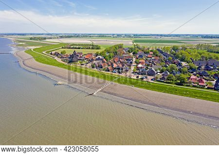 Aerial from the little village Wierum at the Wadden Sea in Friesland the Netherlands