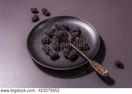 Blackberries On A Ceramic Plate, Frozen Fruits For A Healthy Food Diet