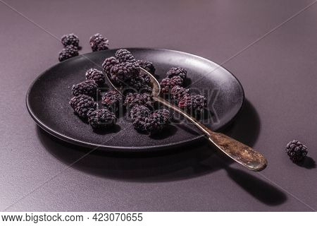Blackberries On A Ceramic Plate, Frozen Fruits For A Healthy Food Diet