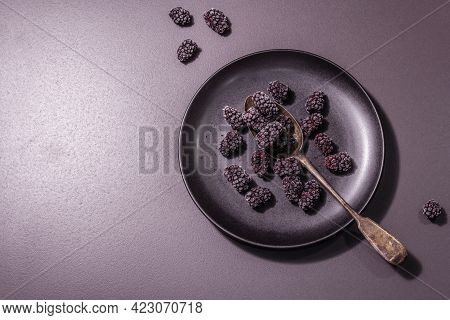 Blackberries On A Ceramic Plate, Frozen Fruits For A Healthy Food Diet