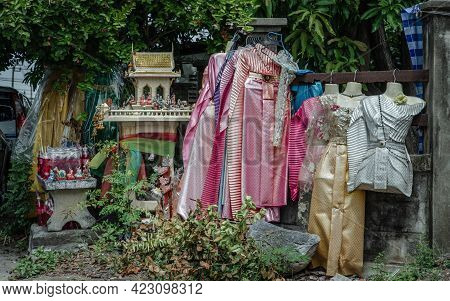A Spirit House Or Joss House Built For Guardian Spirit To Reside With Traditional Thai Costumes And 