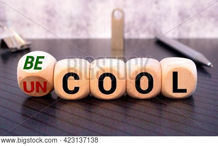 Uncool And Becool Word On Wooden Block