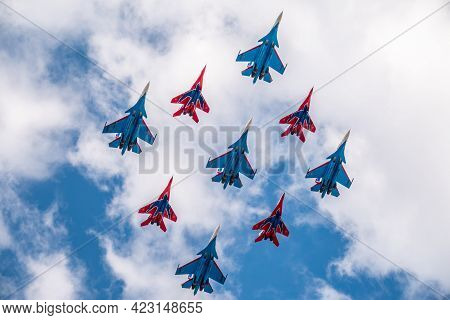 Moscow, Russia - May, 05, 2021: Diamond-shape Of 4 Mig-29 The Russian Knights And 5 Su-27 Swifts In 