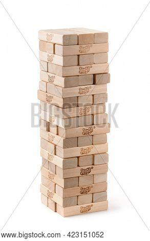 Samara, Russia - May 2021. Jenga wooden block tower isolated on white