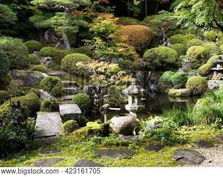 Kiso, Nagano Prefecture, Japan - October 23, 2017: Traditional Japanese Landscape Garden With Pond A