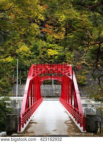 Agematsu, Nagano Prefecture, Japan - October 23, 2017: Red Bridge Over The Kiso River At Kiso-no-kak