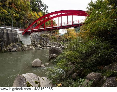 Red Bridge Over The Kiso River At Kiso-no-kakehashi, A Scenic Spot In Kiso Valley - Nagano Prefectur
