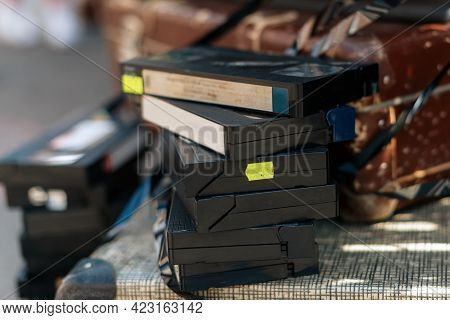 Vintage Old Videotapes Vhs In A Stack Lie On The Tv.