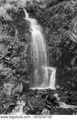 Long Exposure Of The Hollowbrook Waterfall On The South West Coastpath From Woody Bay To Heddons Mou