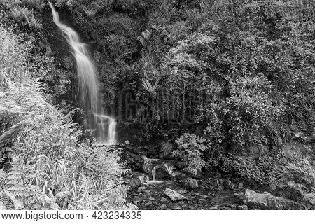 Long Exposure Of The Hollowbrook Waterfall On The South West Coastpath From Woody Bay To Heddons Mou
