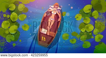 Woman In Bikini Relaxes In Boat Floating In River Or Lake. Top View Of Water Surface With Lily Leave