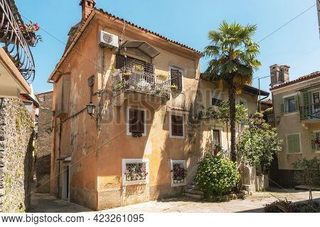 Courtyard In The Old Town Of Lovran On The Adriatic Coast, Croatia.