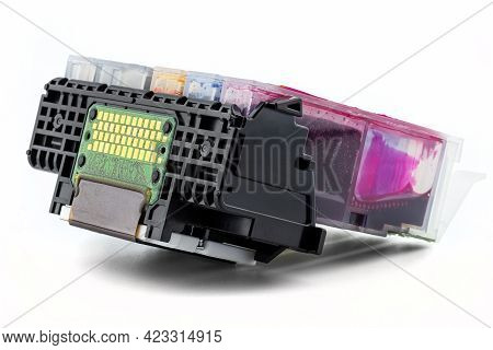 A Close-up Shot Of A Printer Head And Ink Cartridges Inserted Into It, Isolated On A White Backgroun