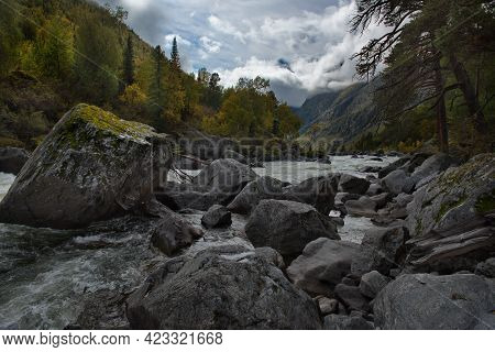 Russia. South Of Western Siberia, Altai Mountains. Early Autumn On The Mountain River Chulcha (a Tri