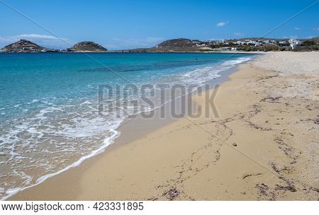 Sandy Beach, Ocean Sea Water Touches Wet Sand, Summer Vacations Concept