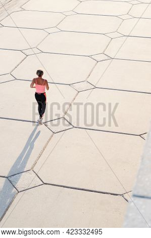 Active Seniors Woman Running In The City