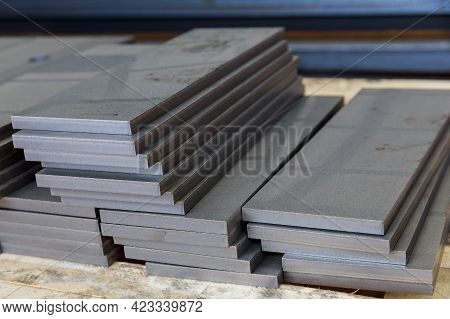 The Metal Parts Are Cleaned Of Jizz And Stacked On A Pallet. A Thick Sheet Of Metal Cut On A Plasma 