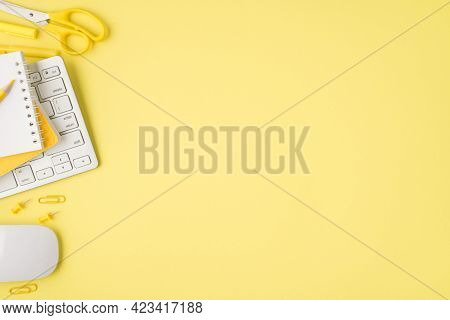 Overhead Photo Of Notepad Pencil Pen Keyboard Felt-tip Paperclips And Computer Mouse Isolated On The