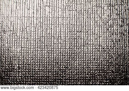 Closeup Detail Of Industrial Shinny Aluminum Metal Background Texture With Embossed Square Shapes