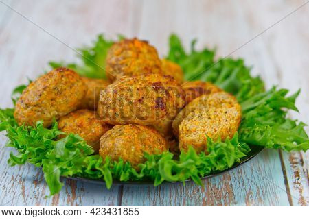 Homemade Cutlets With Salad On A Wooden Table. Healthy Fand Tasty Food