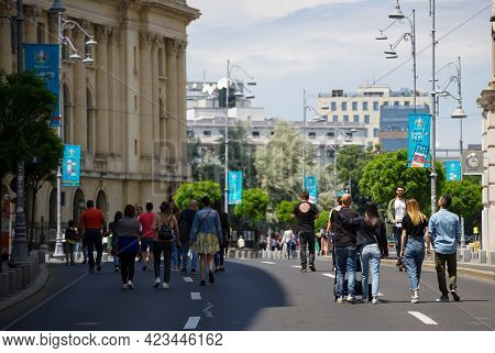 Bucharest, Romania - June 08, 2021: People Are Walking On Calea Victoriei. Several Streets In The Ce