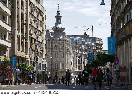 Bucharest, Romania - June 08, 2021: People Are Walking On Calea Victoriei. Several Streets In The Ce