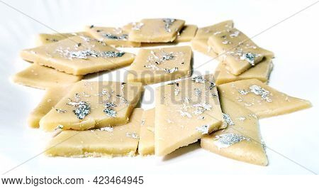 Kaju Katli Is A Diamond Shape Indian Sweet Made Using Cashew Sugar And Mava, Served In A Plate Isola